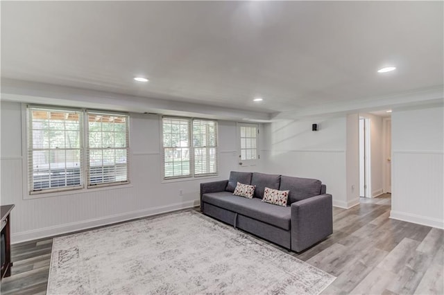 4246 Stilson Cir, Peachtree Corners, GA 30092 - living room with wood finished floors, a wainscoted wall, recessed lighting, and a decorative wall