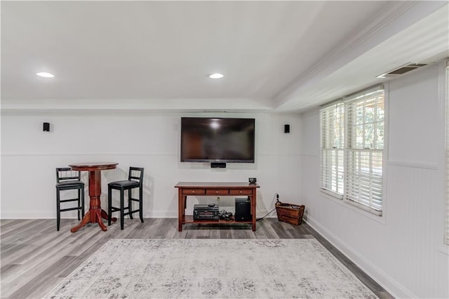 4246 Stilson Cir, Peachtree Corners, GA 30092 - living area with wood finished floors, crown molding, wainscoting, and recessed lighting