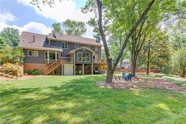 4246 Stilson Cir, Peachtree Corners, GA 30092 - back of property with stairs, a deck, a fire pit, a lawn, and a patio area