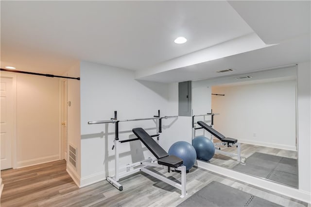 4246 Stilson Cir, Peachtree Corners, GA 30092 - exercise room featuring baseboards, wood finished floors, recessed lighting, and electric panel