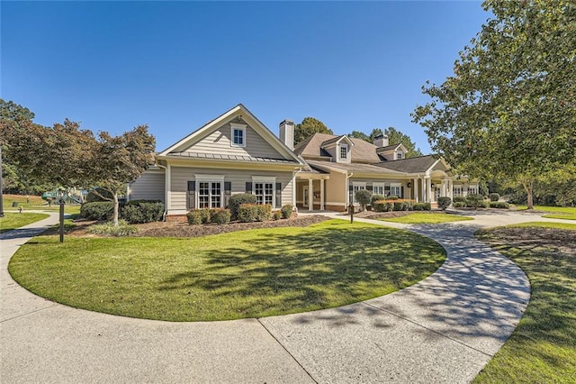 view of front of home with a front yard