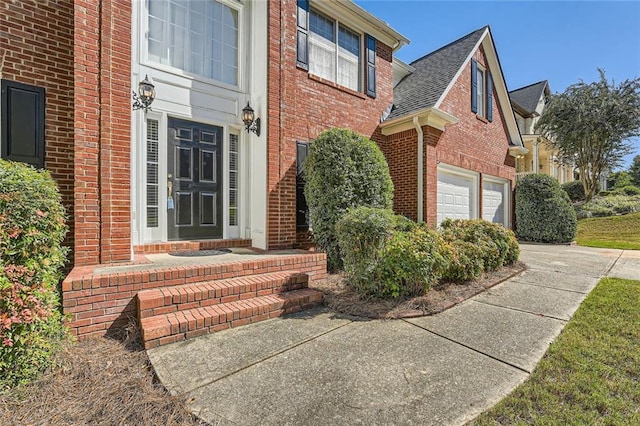 property entrance with a garage