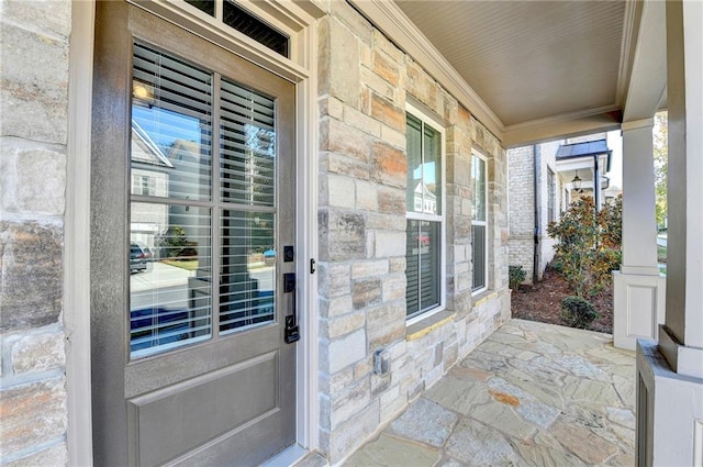 doorway to property with covered porch