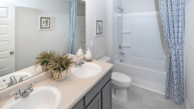 full bathroom featuring double sink vanity, toilet, tile patterned floors, and shower / bath combination with curtain