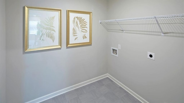 12000 Conrad, Hampton, GA 30228 - laundry area with hookup for a washing machine, baseboards, hookup for an electric dryer, and tile patterned floors