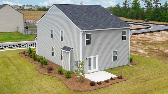 12000 Conrad, Hampton, GA 30228 - back of house featuring a patio area and a shingled roof
