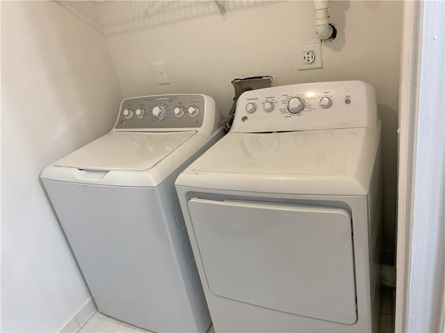 laundry room featuring washing machine and dryer