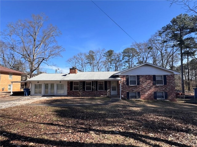 view of front facade with covered porch and central air condition unit