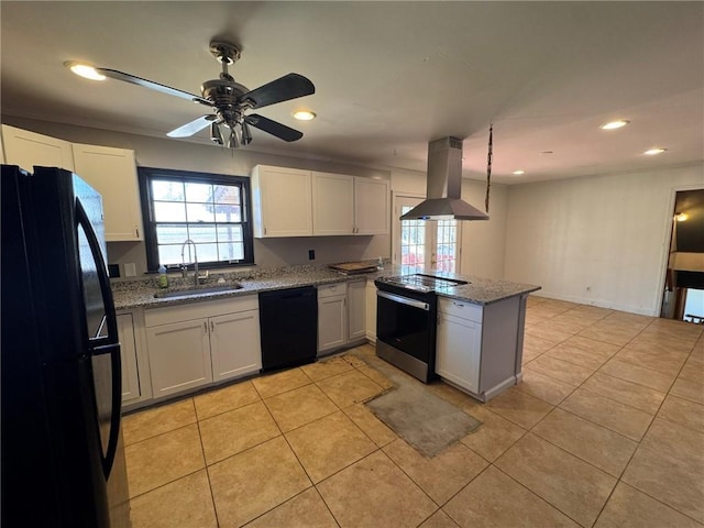 kitchen featuring sink, island range hood, black appliances, white cabinets, and kitchen peninsula