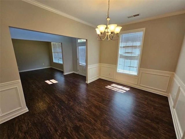 1021 Rock Elm Dr, Auburn, GA 30011 - unfurnished room featuring a chandelier, wood finished floors, crown molding, and a wainscoted wall