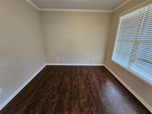 1021 Rock Elm Dr, Auburn, GA 30011 - unfurnished room featuring dark wood finished floors, ornamental molding, baseboards, and healthy amount of natural light