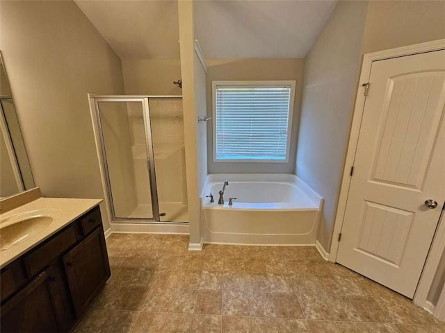 1021 Rock Elm Dr, Auburn, GA 30011 - bathroom with vanity, a shower stall, and a garden tub
