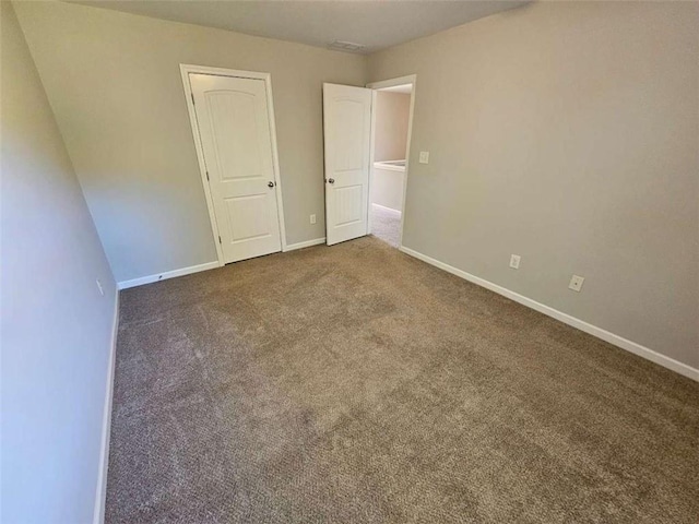 1021 Rock Elm Dr, Auburn, GA 30011 - unfurnished room featuring carpet flooring and baseboards