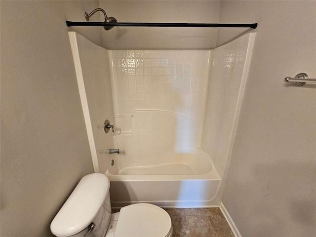 1021 Rock Elm Dr, Auburn, GA 30011 - full bathroom featuring toilet,  shower combination, and tile patterned flooring