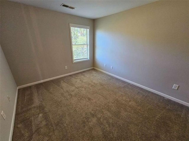 1021 Rock Elm Dr, Auburn, GA 30011 - spare room with baseboards and carpet flooring