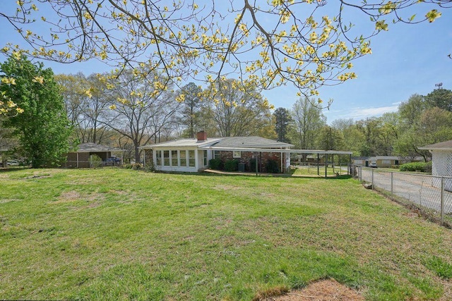 view of yard with fence