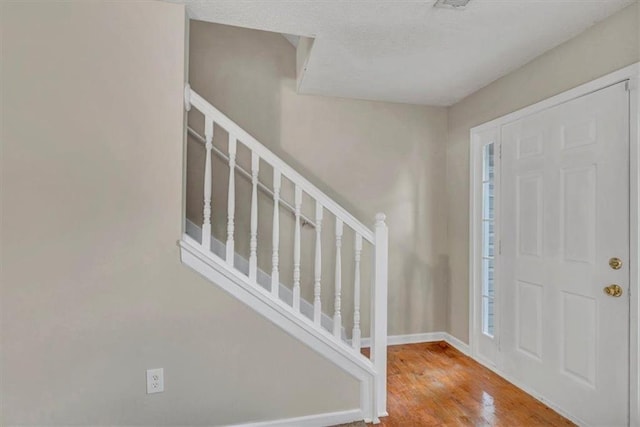 foyer featuring hardwood / wood-style flooring