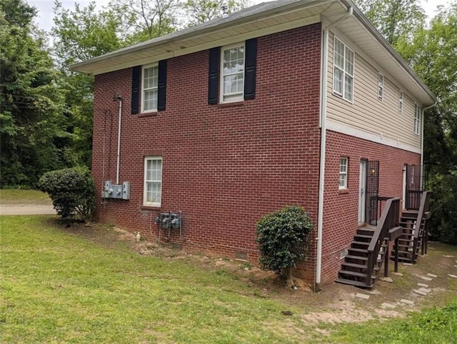 view of property exterior featuring a yard