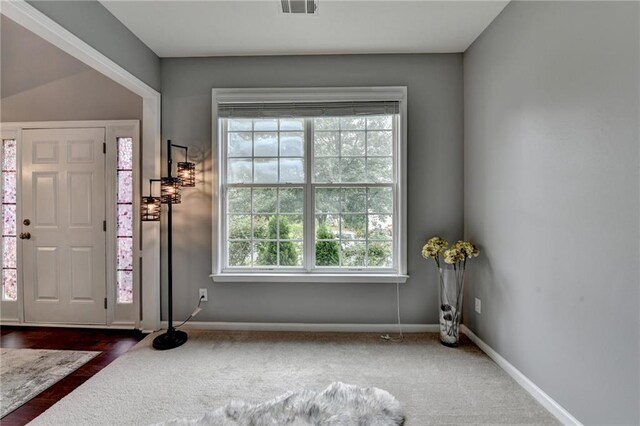 450 Hilingdon Way, Suwanee, GA 30024 - foyer entrance featuring baseboards and dark carpet
