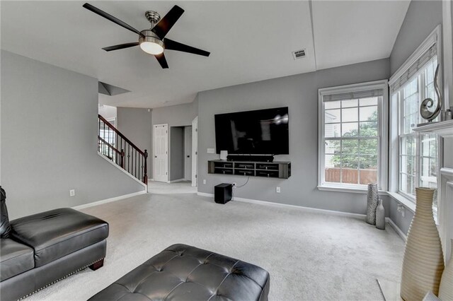 450 Hilingdon Way, Suwanee, GA 30024 - living room with stairway, carpet floors, a ceiling fan, and baseboards