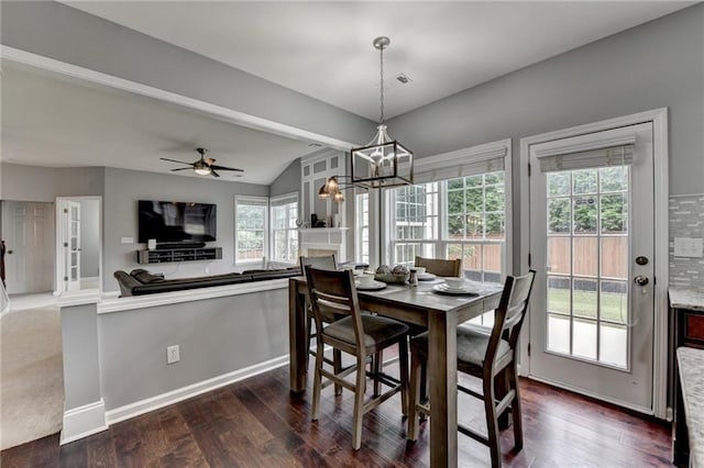450 Hilingdon Way, Suwanee, GA 30024 - dining room featuring dark wood-style flooring, vaulted ceiling, a chandelier, and ceiling fan
