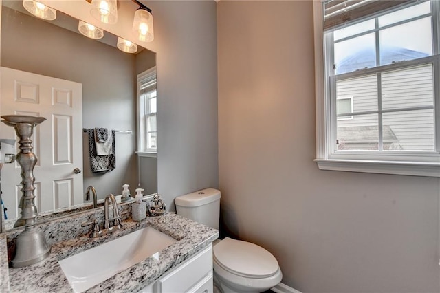 450 Hilingdon Way, Suwanee, GA 30024 - half bath featuring toilet, vanity, and baseboards