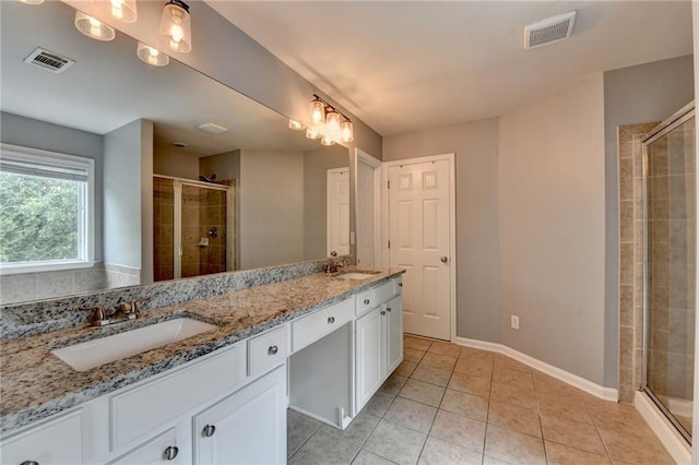 450 Hilingdon Way, Suwanee, GA 30024 - full bathroom featuring double vanity, tile patterned floors, a shower stall, and baseboards