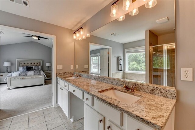 450 Hilingdon Way, Suwanee, GA 30024 - full bathroom featuring ensuite bath, double vanity, a shower stall, tile patterned floors, and a ceiling fan