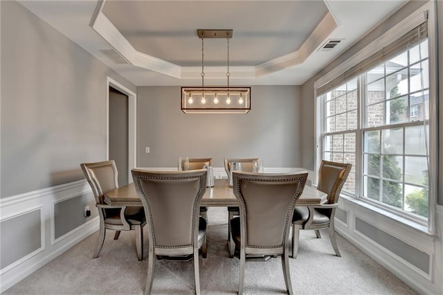 450 Hilingdon Way, Suwanee, GA 30024 - dining space featuring carpet floors, a raised ceiling, a wainscoted wall, and a decorative wall