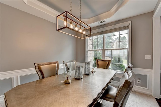 450 Hilingdon Way, Suwanee, GA 30024 - dining area featuring a chandelier, a tray ceiling, ornamental molding, a decorative wall, and wainscoting