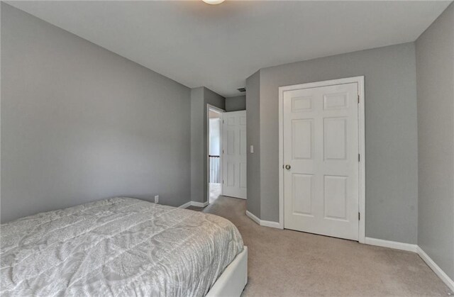 450 Hilingdon Way, Suwanee, GA 30024 - carpeted bedroom featuring baseboards
