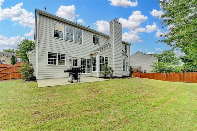 450 Hilingdon Way, Suwanee, GA 30024 - back of property featuring a patio and a chimney