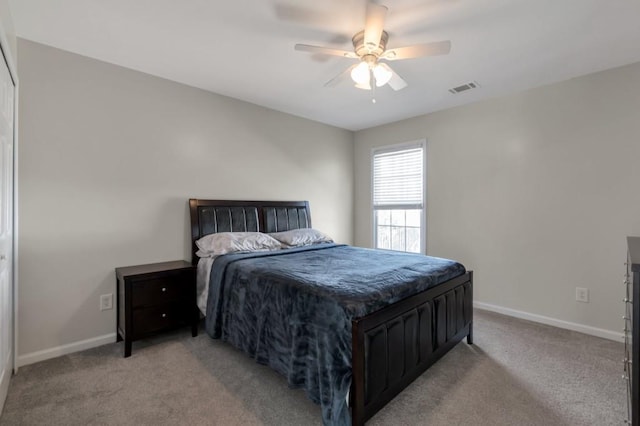 carpeted bedroom with ceiling fan