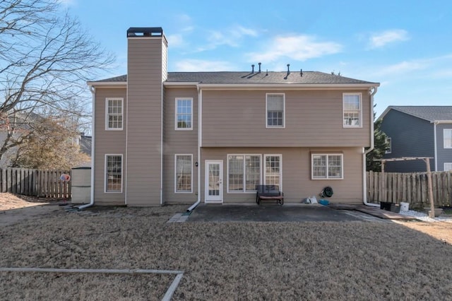 rear view of house featuring a patio