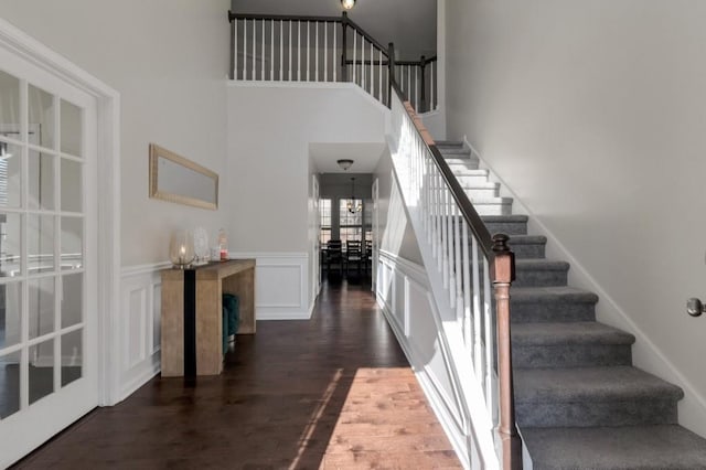 staircase featuring hardwood / wood-style flooring