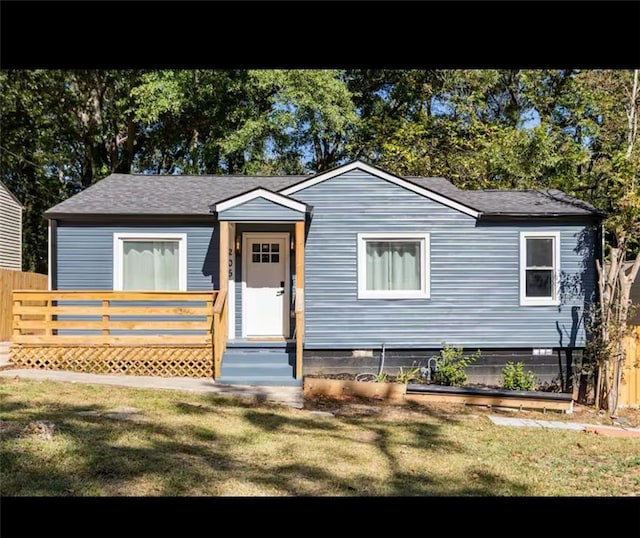 view of front of home with a front yard