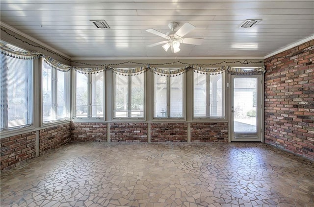 unfurnished sunroom with visible vents and ceiling fan