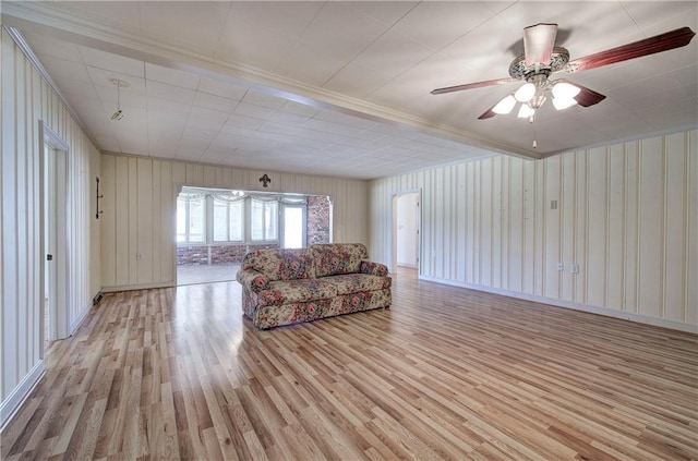 living area with light wood-type flooring and ceiling fan