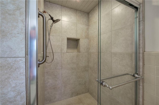 bathroom featuring a shower stall