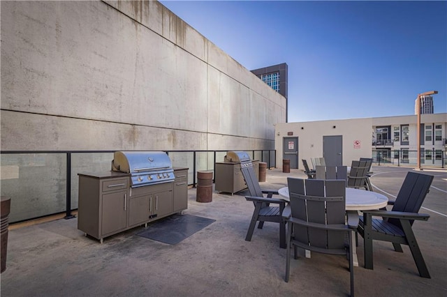 view of patio featuring a grill