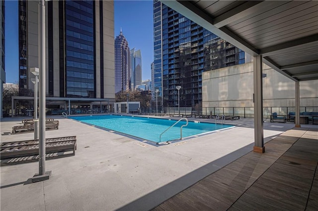 view of pool featuring a patio