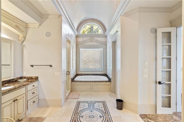 bathroom featuring tile patterned floors, vanity, crown molding, and independent shower and bath