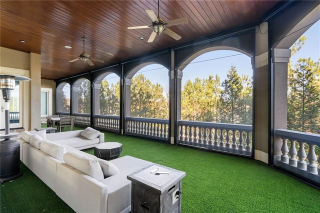 unfurnished sunroom with wooden ceiling