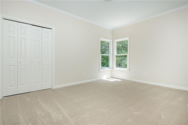 1096 Bridge Mill Ave, Canton, GA 30114 - unfurnished bedroom with carpet floors, baseboards, ornamental molding, and a closet