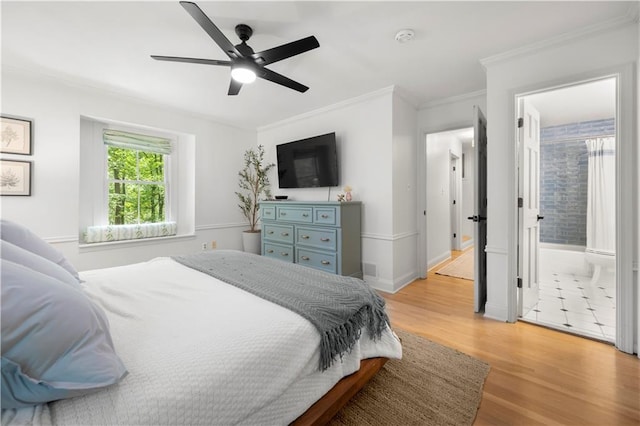 1104 Warrenhall Ln NE, Brookhaven, GA 30319 - bedroom with ornamental molding, light wood finished floors, ceiling fan, and connected bathroom