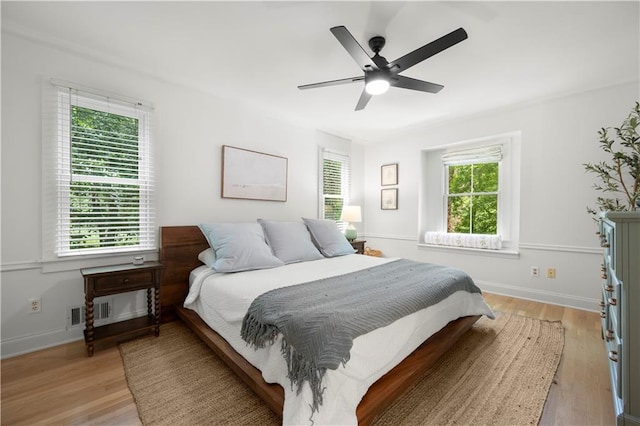 1104 Warrenhall Ln NE, Brookhaven, GA 30319 - bedroom featuring light wood-style floors and a ceiling fan