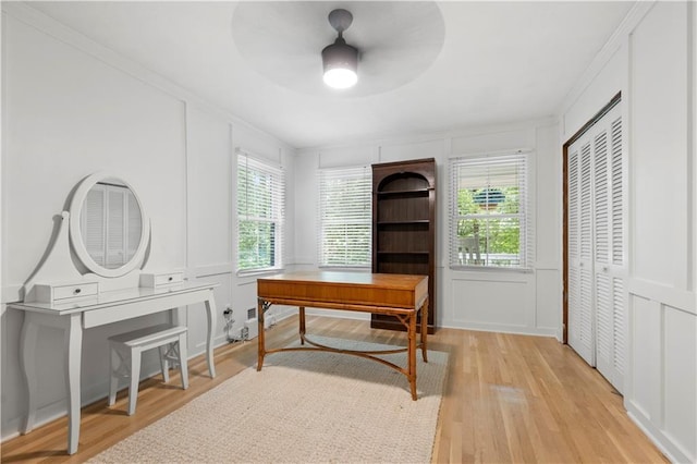 1104 Warrenhall Ln NE, Brookhaven, GA 30319 - office with a decorative wall, light wood-type flooring, a ceiling fan, and ornamental molding