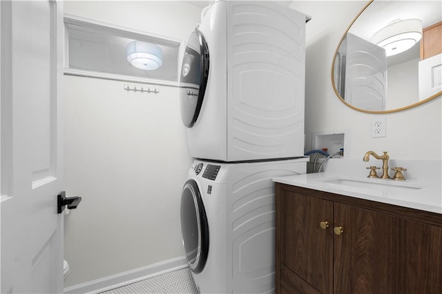 1104 Warrenhall Ln NE, Brookhaven, GA 30319 - laundry area featuring estacked washer and dryer and baseboards