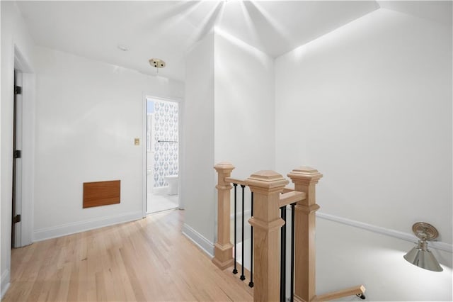 1104 Warrenhall Ln NE, Brookhaven, GA 30319 - hallway featuring an upstairs landing and wood finished floors