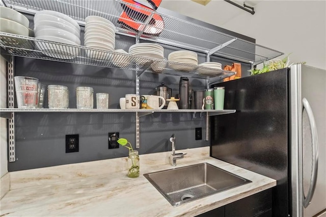 19 Hilliard St SE Unit 13, Atlanta, GA 30312 - kitchen featuring freestanding refrigerator and a sink
